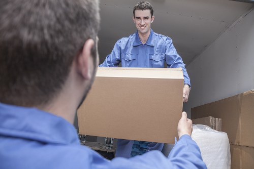 Careful packing of fragile household items by Southtottenham movers