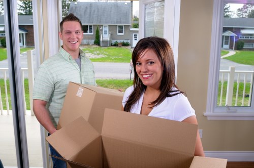 Office removals planning in Southtottenham with moving boxes and desks