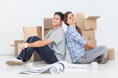 Local packing team arranging boxes for home and office relocation